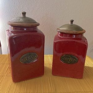 2 red stoneware coffee/tea canisters (f)